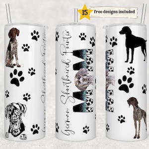 May include: White tumbler with a black and white German Shorthaired Pointer design. The tumbler has a black paw print pattern and the text "German Shorthaired Pointer" on the side.