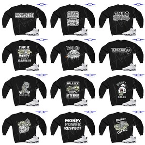 Pu&ograve; includere: Un collage di dieci felpe nere con diversi design grafici e testo bianco. Ogni felpa &egrave; abbinata a una scarpa bianca e grigia. I design includono "Legendary", "Vision Bigger than the Bigger Picture", "True to My Name", "Time is Money Don't Waste It", "Roll Up", "Raw AF", "Rack It Up", "0% Luck 100% Off the Muscle", "Money Talks", "Paper Chaser", "Money Power Respect", and "Married to the Game".