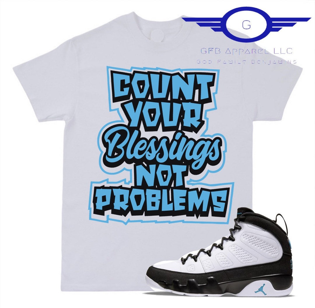 university blue jordan 9 shirt