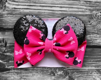 May include: A pink bow with black polka dots and black sequin mouse ears headband.