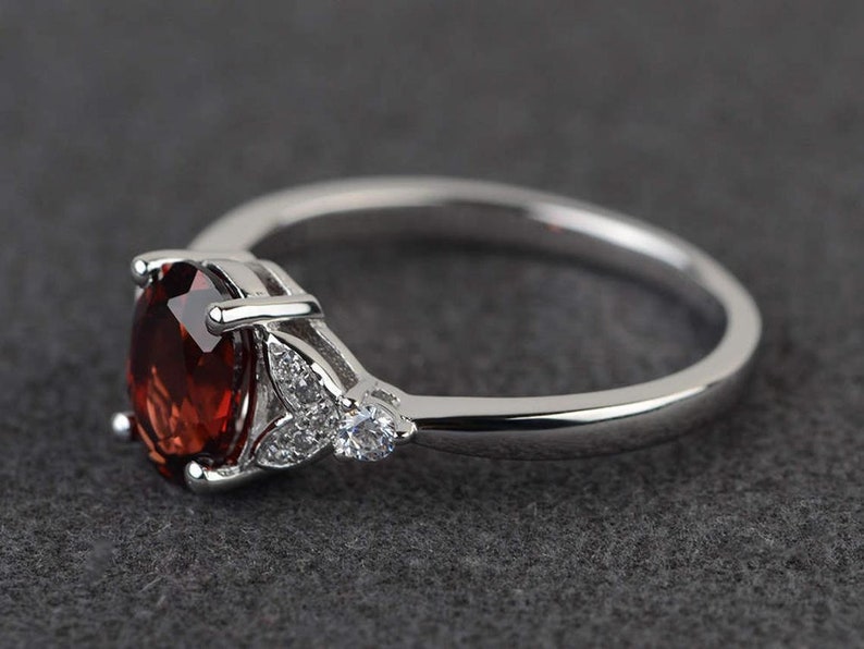 1.35 Carat Oval Cut Red Garnet With Round Cut CZ Diamond Promise Ring In 925 Silver