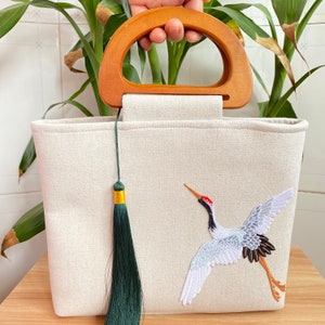 Borsa semicircolare con manico in legno Modello gru volante Borsa in tessuto di lino Nappa staccabile Regalo per ragazza da donna in stile cinese retrò