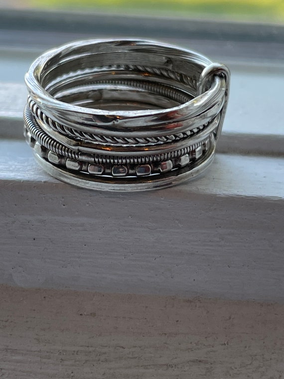 7 stackable Sterling Rings All different - image 2
