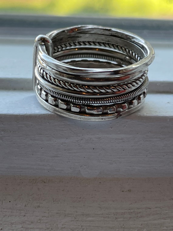 7 stackable Sterling Rings All different - image 3