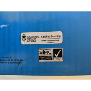 May include: A blue box with two certifications. The first certification is for Sustainable Forestry Initiative (SFI) with the text "Certified Sourcing" and the website address "www.sfiprogram.org". The second certification is for a company that is compliant with the International Imaging Technology Council (IITC) standards. The text on the second certification reads "SIMC Standards Test Methods Committee Compliant Company".