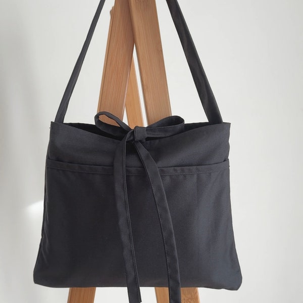 Petit sac fourre-tout noir fait main avec fermeture à nœud