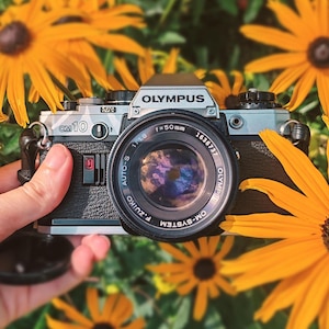 Olympus OM-10 35mm Film Camera w/ 50mm F1.8 Lens – Silver SLR, Manual Focus, Vintage Tested & Near Mint