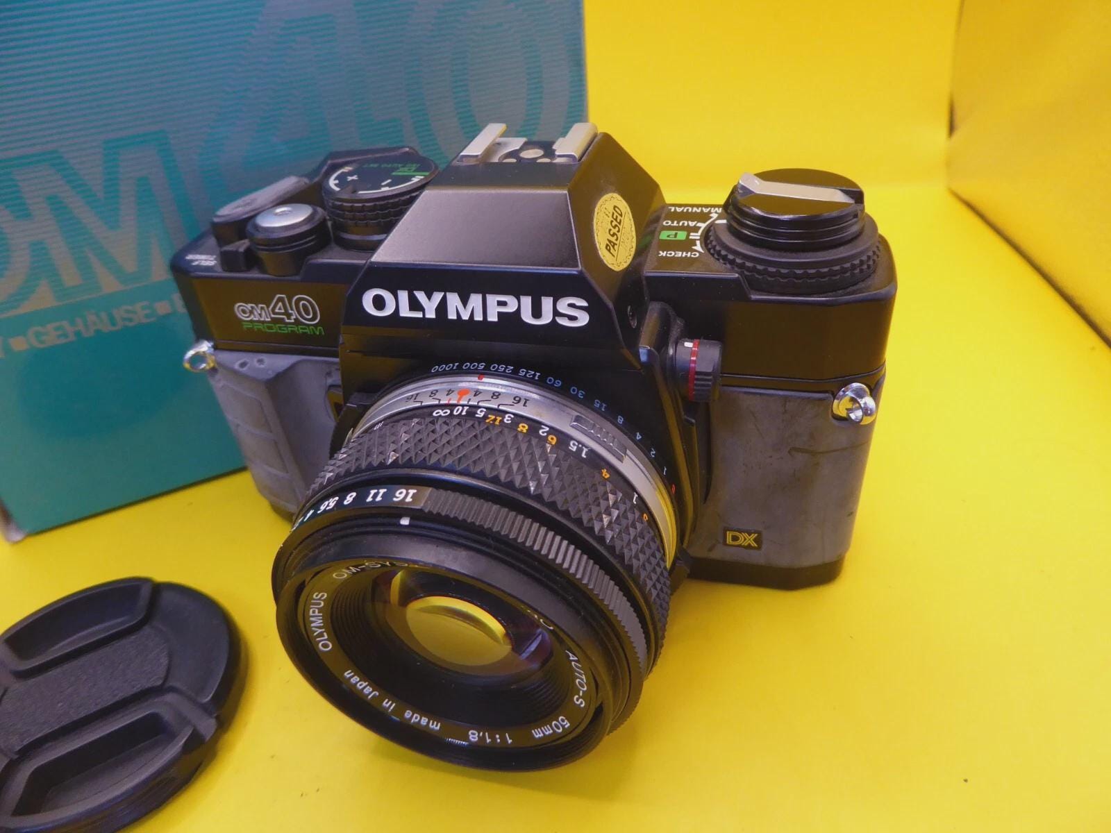 Olympus OM-40 Program 35mm Film Camera W/ 50mm F1.8 Zuiko Lens