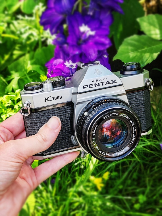 Pentax K1000 35mm Film Camera W/ 50mm F/1.7 Lens – New Seals