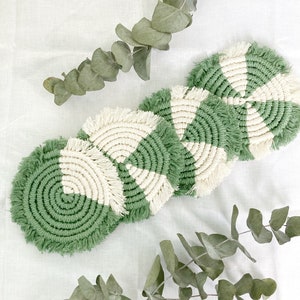 Set of four handmade macramé coasters green/natural
