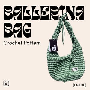May include: A sage green crocheted bag with the text "BALLERINA BAG" and "Crochet Pattern". The bag has a rounded shape with a drawstring closure and a tag with a snail logo. The bag is made of thick yarn.