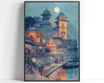 May include: Framed watercolour print of an Indian cityscape at dusk. The artwork depicts ornate buildings with domes and arches along a river, illuminated by warm light. Figures in traditional attire are seen near the water, with a full moon in the sky.