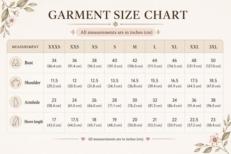 May include: A beige garment size chart with brown text and floral accents. The table lists measurements for bust, shoulder, armhole, and sleeve length in inches and centimeters for sizes ranging from XXXS to 3XL, with icons for each category.