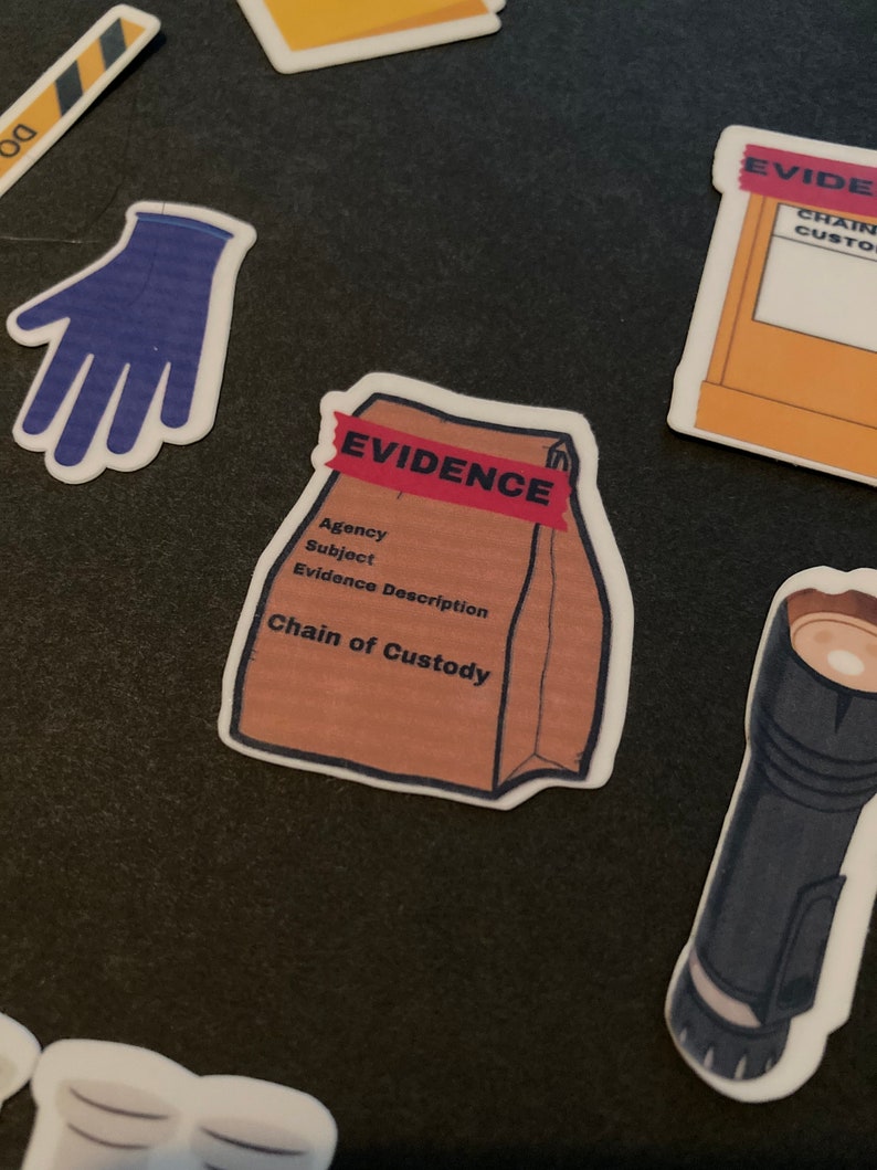 May include: A brown paper bag with a red tape that says "EVIDENCE" on it. The bag has the words "Agency, Subject, Evidence Description, Chain of Custody" printed on it.