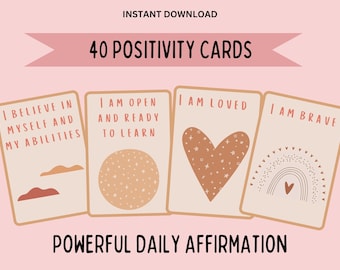 May include: Set of 40 positivity affirmation cards with illustrations. The cards feature phrases like "I believe in myself and my abilities", "I am open and ready to learn", "I am loved", and "I am brave".