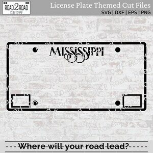 May include: Black and white digital cut file design of a Mississippi license plate. The design includes the state name "MISSISSIPPI" with a decorative flourish and two rectangular spaces for numbers or letters. The text "Where will your road lead?" is at the bottom of the design.