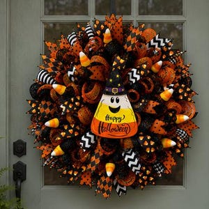 May include: A Halloween wreath with orange, black, and white ribbons and candy corn accents. A candy corn-shaped decoration with a witch hat and the words "Happy Halloween" is in the center. The wreath is hanging on a gray door.