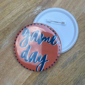 Pin de botón del día del juego de Auburn