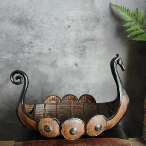 a Viking's Leading Ship Dragon Viking Boat ocean cruises Decorative Handmade Wooden pirate ship | Viking Longboat, Dragon Boat