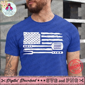 May include: Blue t-shirt featuring a white graphic of an American flag made of grilling tools. The flag design includes stars, stripes, a spatula, and a fork. The shirt has a crew neck and short sleeves. The text "Digital Download SVG and PNG" is at the bottom.