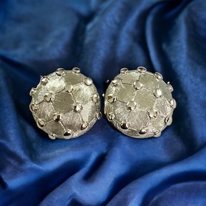 Signed Nina Ricci Clip On Earrings. Silver Nina Ricci Clip-Ons. Nina Ricci Domed Cluster Earrings. Brushed Silver. Round Clip Earrings.