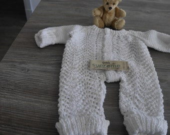 hand knitted baby romper in 100% cotton beautiful  design with button detail and cuffs  fit newborn