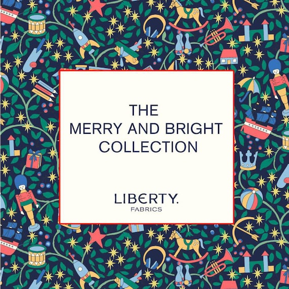 on Lasenby Cotton sold by Vellana All Wrapped Up Navy Liberty Festive Merry and Bright Collection Fabrics for Christmas