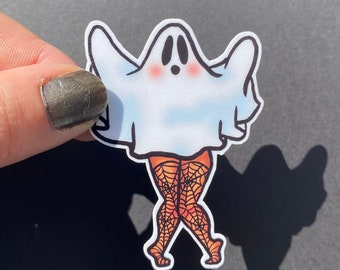 May include: A white ghost with a friendly face wearing orange and black spiderweb patterned stockings. The ghost is standing with its arms raised.