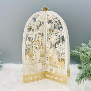 Boule à neige, carte de Noël pop-up 3D, carte de vacances, carte laser en feuille d’or, carte de Noël luxueuse, ville de Noël, église, Noël enneigé
