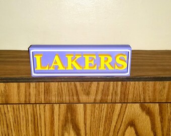 NBA team signs Lakers Sign