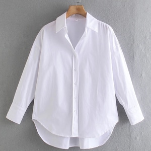 Blusa blanca lisa de mujer sale