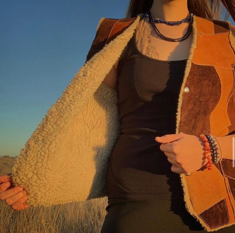 Vintage 80\u2019s Genuine Leather Patchwork Vest w Sherpa Inner Lining and 3 snap buttons made in Mexico