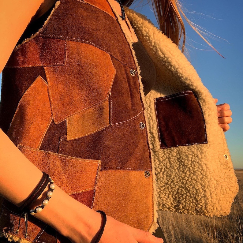Vintage 80\u2019s Genuine Leather Patchwork Vest w Sherpa Inner Lining and 3 snap buttons made in Mexico