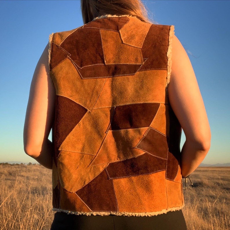 Vintage 80\u2019s Genuine Leather Patchwork Vest w Sherpa Inner Lining and 3 snap buttons made in Mexico