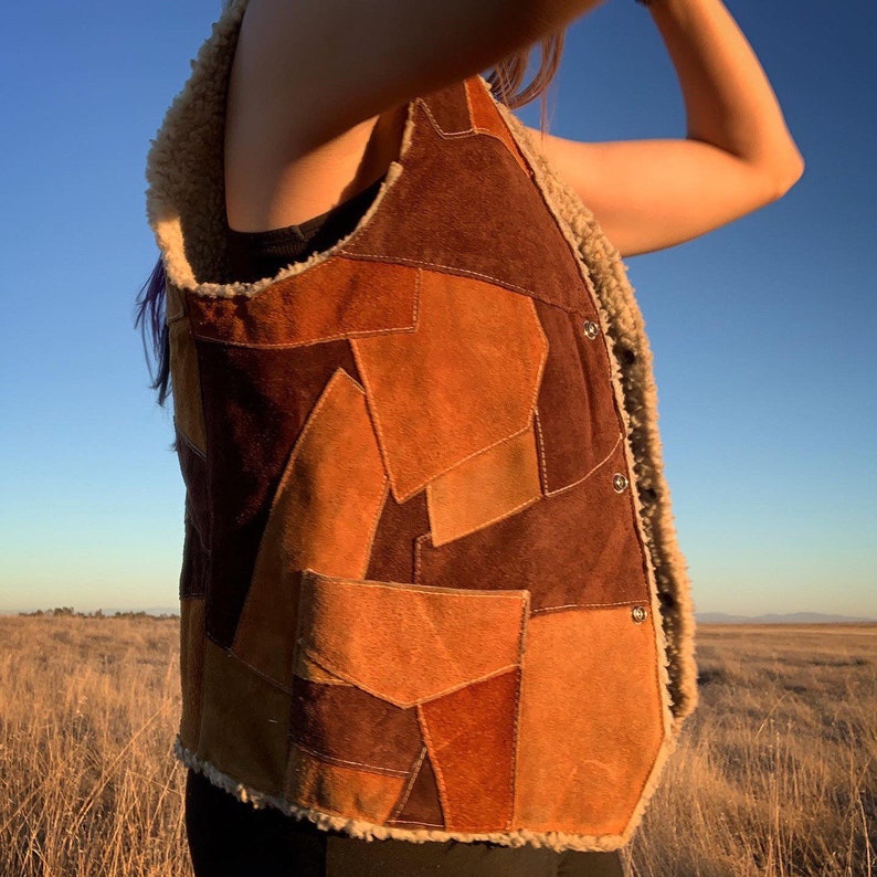 Vintage 80\u2019s Genuine Leather Patchwork Vest w Sherpa Inner Lining and 3 snap buttons made in Mexico