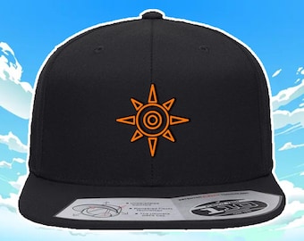 Gorra de béisbol bordada con el Escudo del Valor de Digimon Adventure, color negro liso. Gorra flexible con hilo naranja.