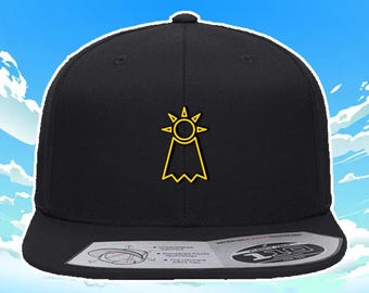 Gorra de béisbol bordada con el Escudo de la Esperanza de Digimon Adventure, color negro liso. Gorra flexible con hilo amarillo/dorado.