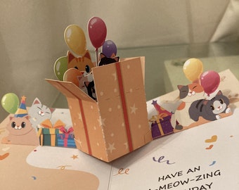 Tarjeta de cumpleaños emergente con lindos gatos en 3D