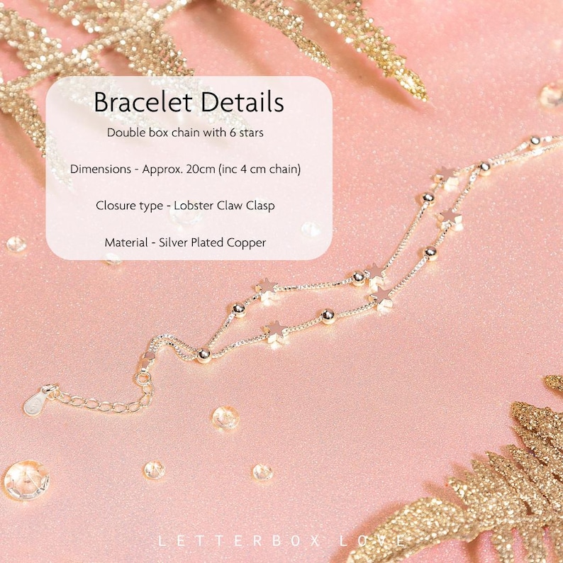 May include: A silver-plated copper bracelet with a double box chain design. The bracelet features six star charms and measures approximately 20cm (including a 4cm chain). It has a lobster claw clasp.