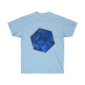 May include: A light blue t-shirt with a hexagonal-shaped design featuring a blue galaxy with white stars and a rainbow checkered border.