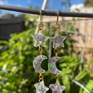 Dangly holographic glitter moon and stars earrings