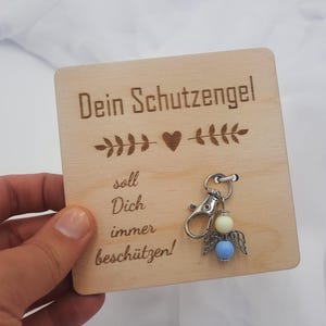 Dein Schutzengel "soll Dich immer beschützen" Schlüsselanhänger Holzkarte 10x10cm - Mutmacher, Spruchkarte, kleines Geschenk , Mitbringsel