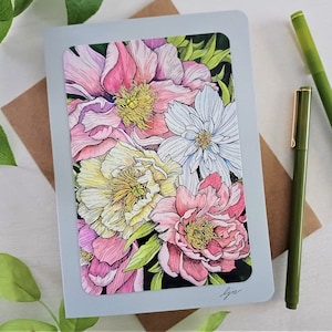 May include: A greeting card featuring a colorful illustration of pink, white, and yellow peonies. The card has a gray background and is signed "lyn."