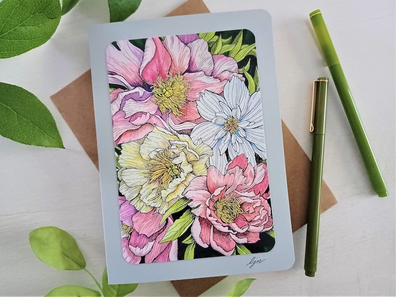May include: A greeting card featuring a colorful illustration of pink, white, and yellow peonies. The card has a gray background and is signed "lyn."