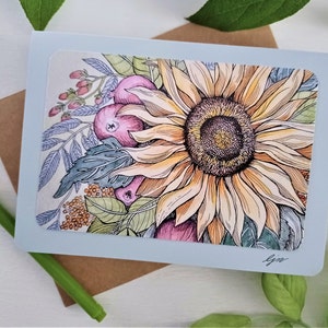 May include: A light blue card with a watercolor illustration of a sunflower with pink and yellow berries. The sunflower is in the center of the card and is surrounded by leaves and berries. The card is signed "Gin" in the bottom right corner.