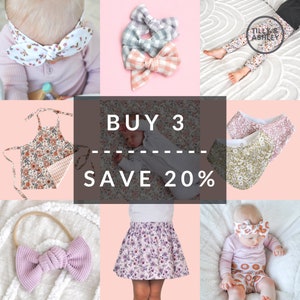 May include: A collage of images featuring various baby clothing items, including a floral print headband, a floral print bib, a floral print skirt, a floral print onesie, and a floral print pair of leggings. The text "BUY 3 SAVE 20%" is displayed in the center of the collage.