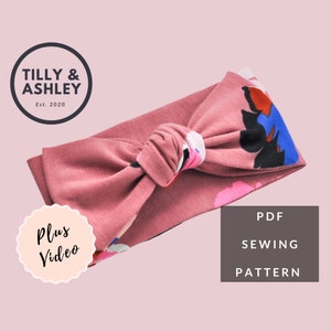 May include: A dusky pink headband with a knotted design. The headband has a floral pattern with blue, pink, and black accents. The image includes the text "Tilly & Ashley Est. 2020", "Plus Video", and "PDF Sewing Pattern".