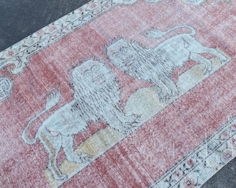 Vintage Lion Motif Turkish Rug: Handmade Wool Accent Rug (4.4x7.4