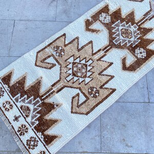 Handmade Wool Oushak Rug: Vintage Turkish Entryway Doormat (2x4 ft.)