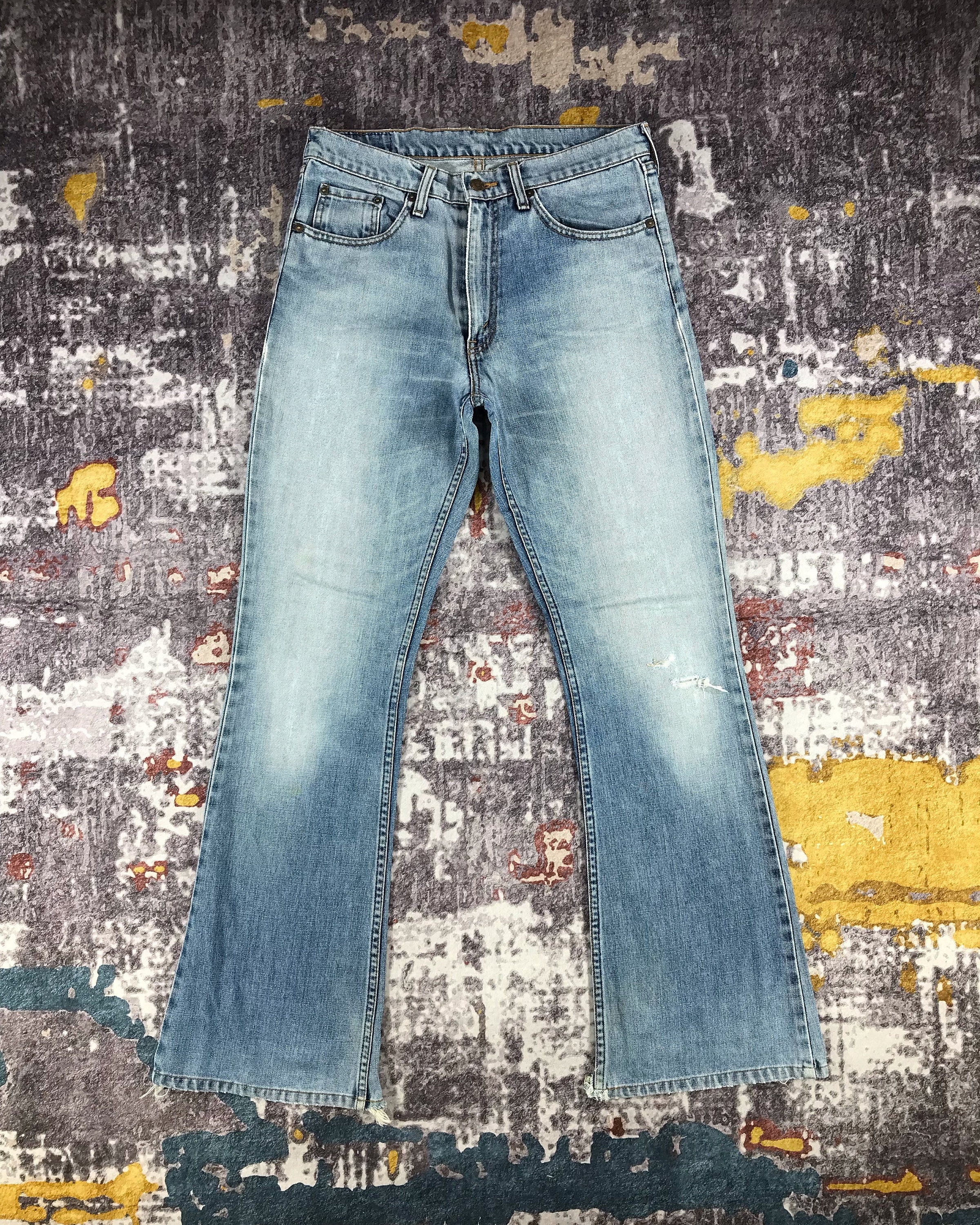 Vintage 90s Light Wash Levis 557 Jeans 